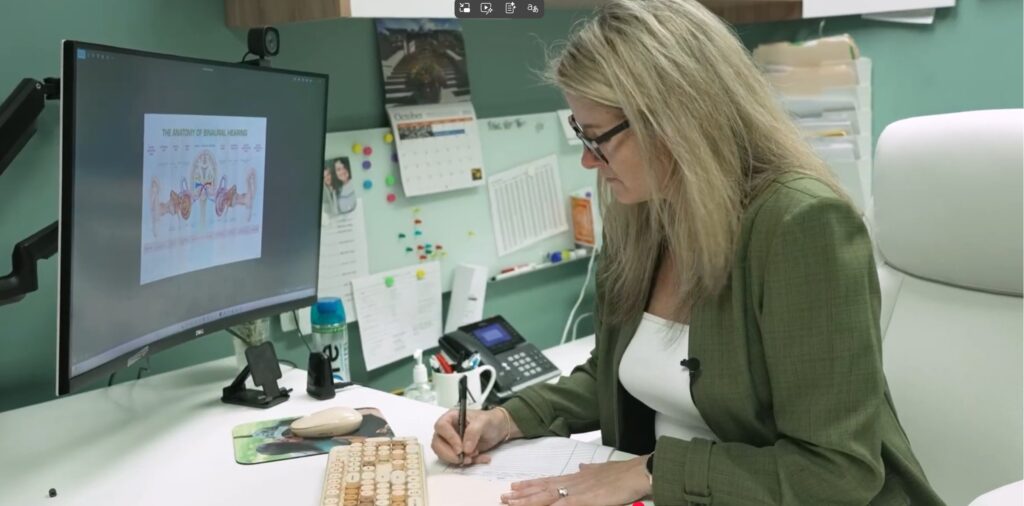 Anita Steinbach at her desk