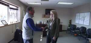 Anita and a client in the lobby